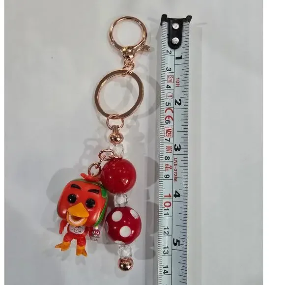 Handmade Beaded Keychain With Reworked Mini Figure - Picture 5 of 10